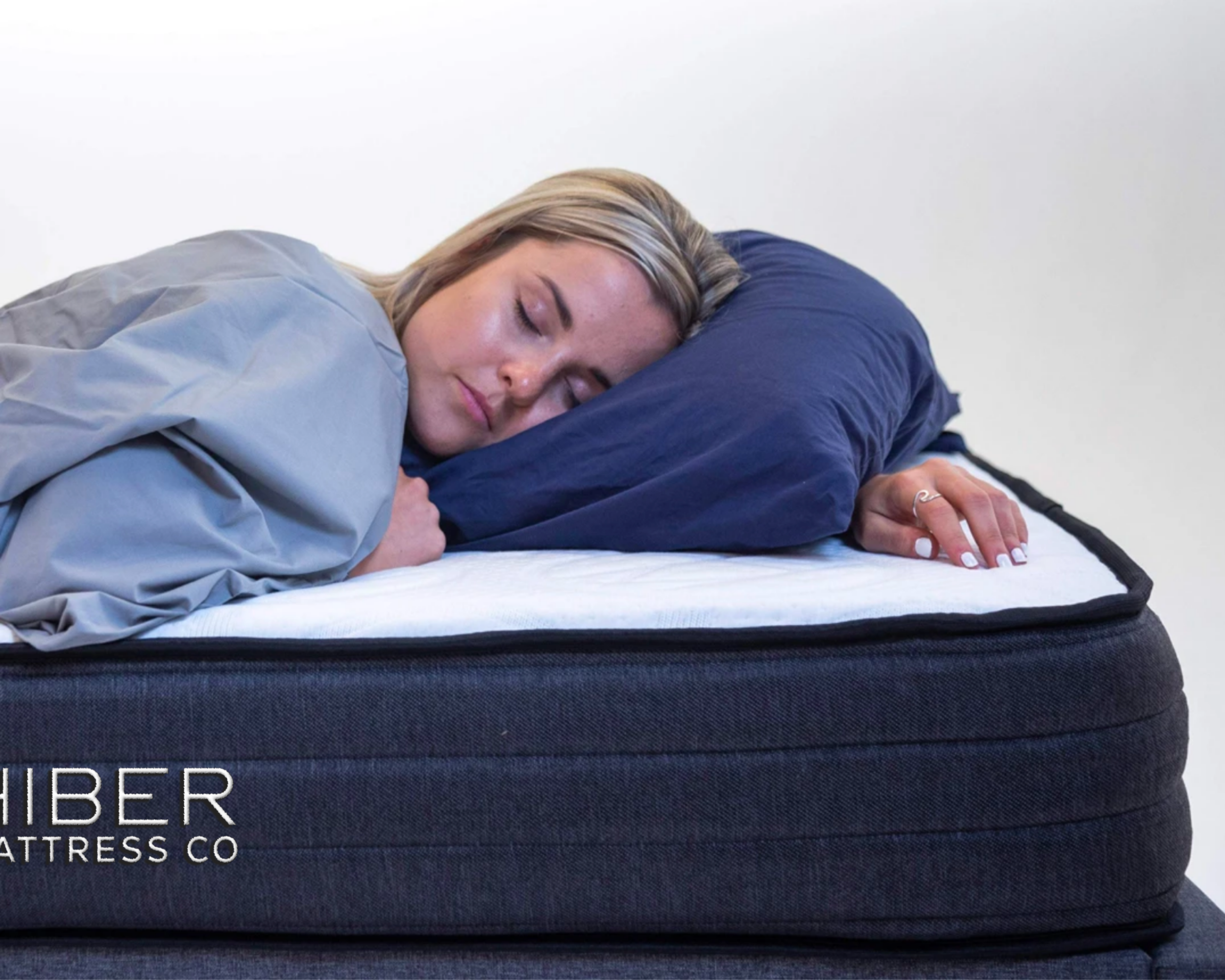 Comfort-focused sleep on Canadian-made HIBER8 mattress, featuring motion-isolating and eco-friendly design.