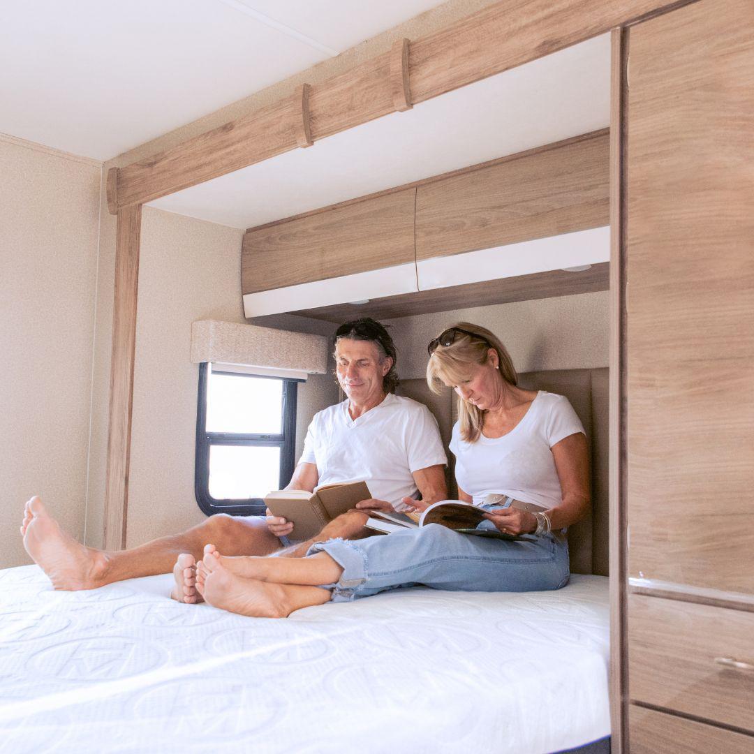 Husband and Wife Reading on a HIBER6 RV Mattress