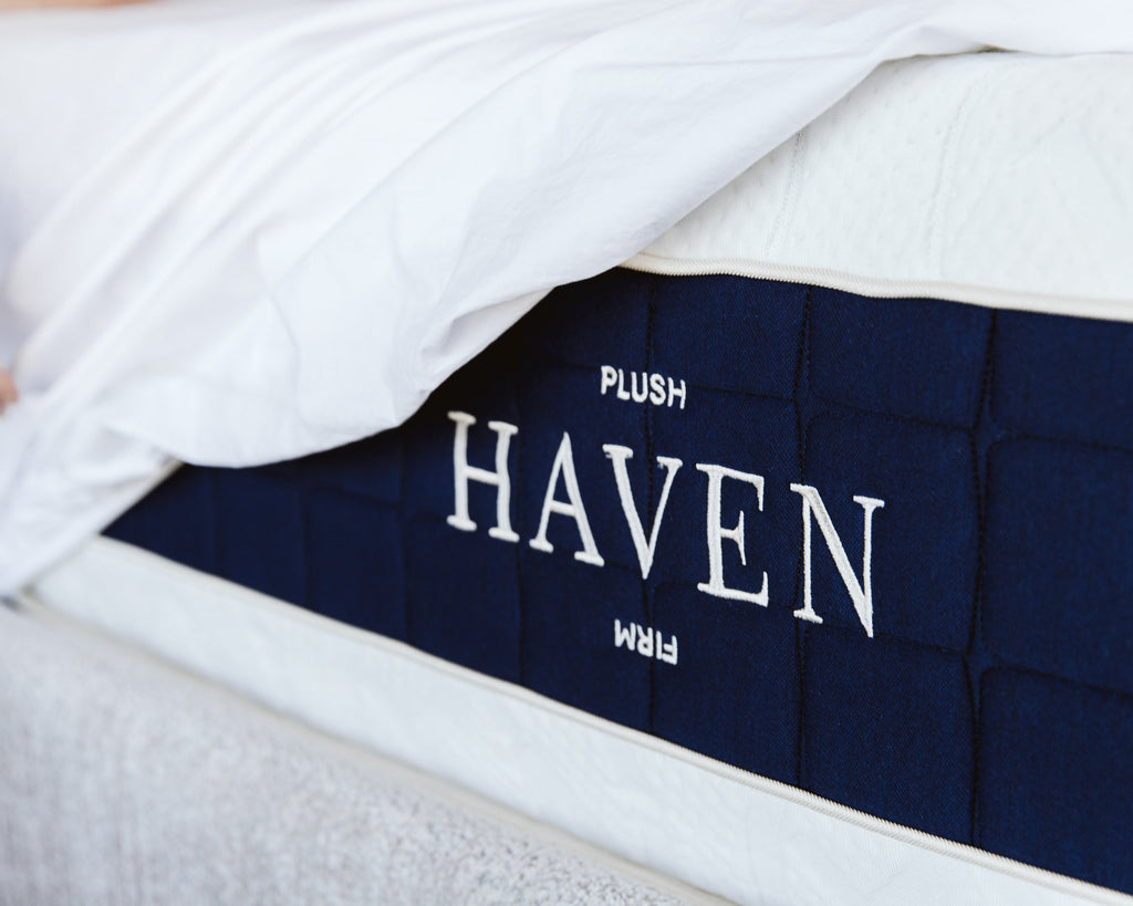Contour mattress side panel with the Haven logo, sheet pulled back