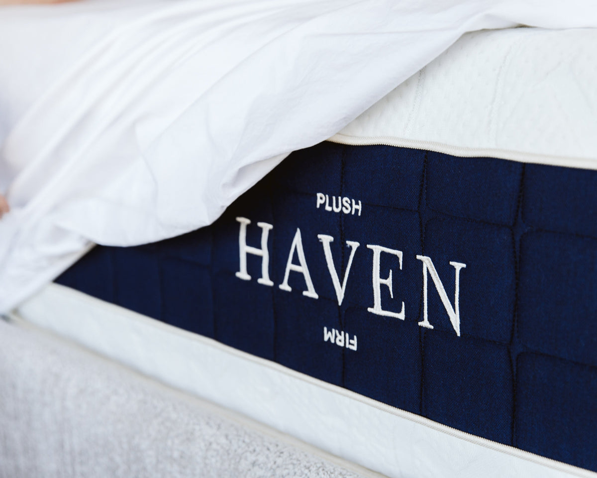 Contour mattress side panel with the Haven logo, sheet pulled back