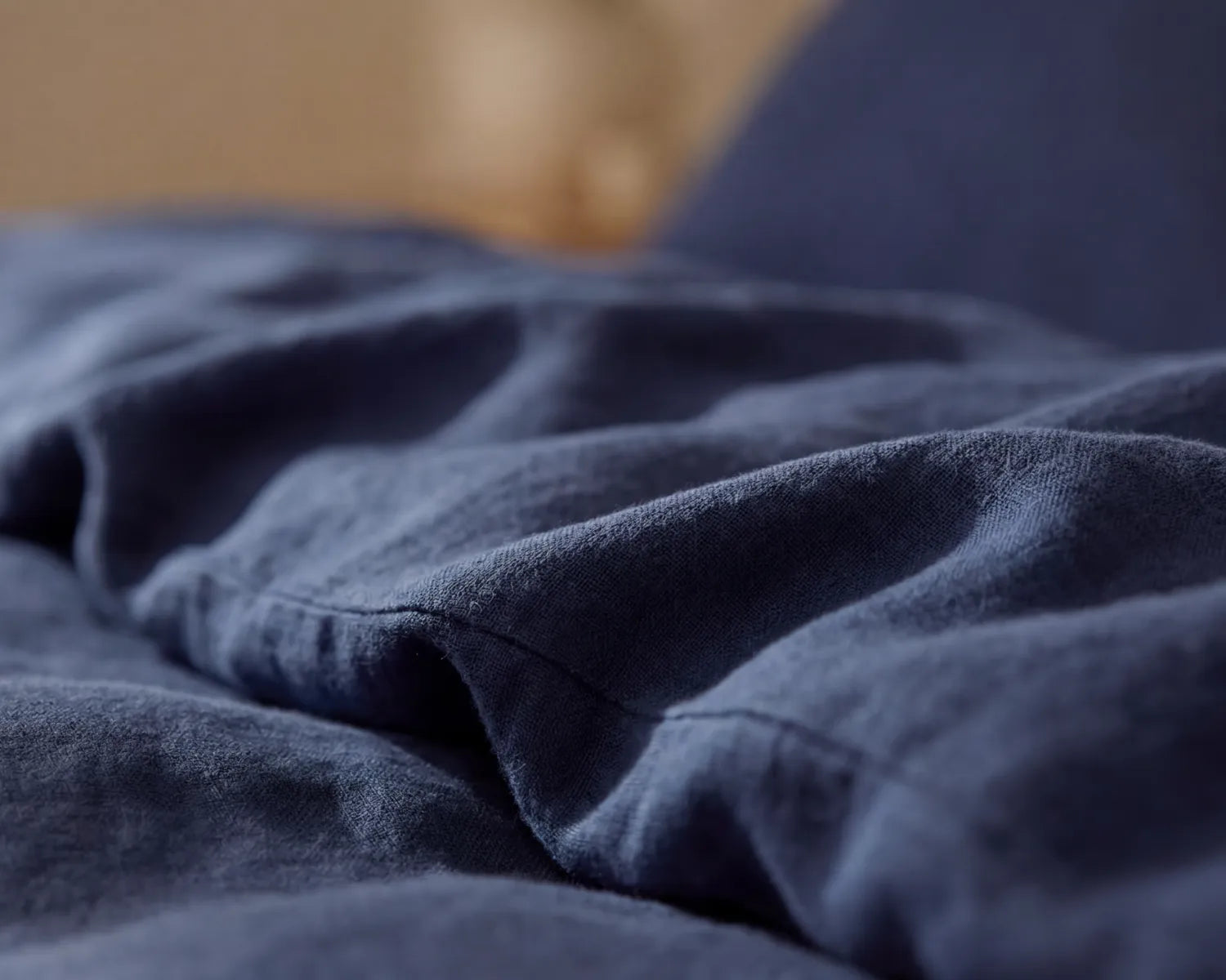 Close-up of blue fabric with a blurred background