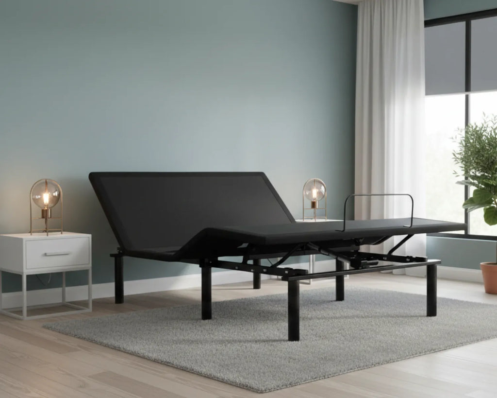 Black adjustable bed in a room with a nightstand and window.