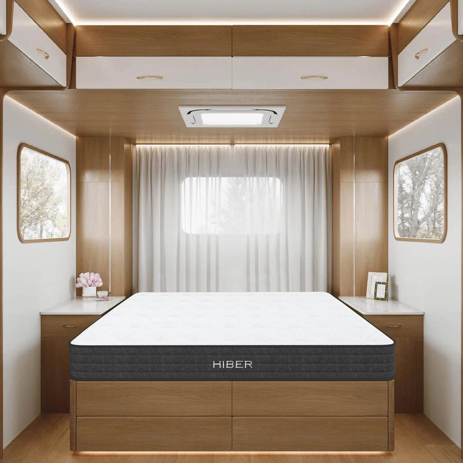 HIBER8 RV Mattress showcased in a beautifully designed RV with a white and oak interior.