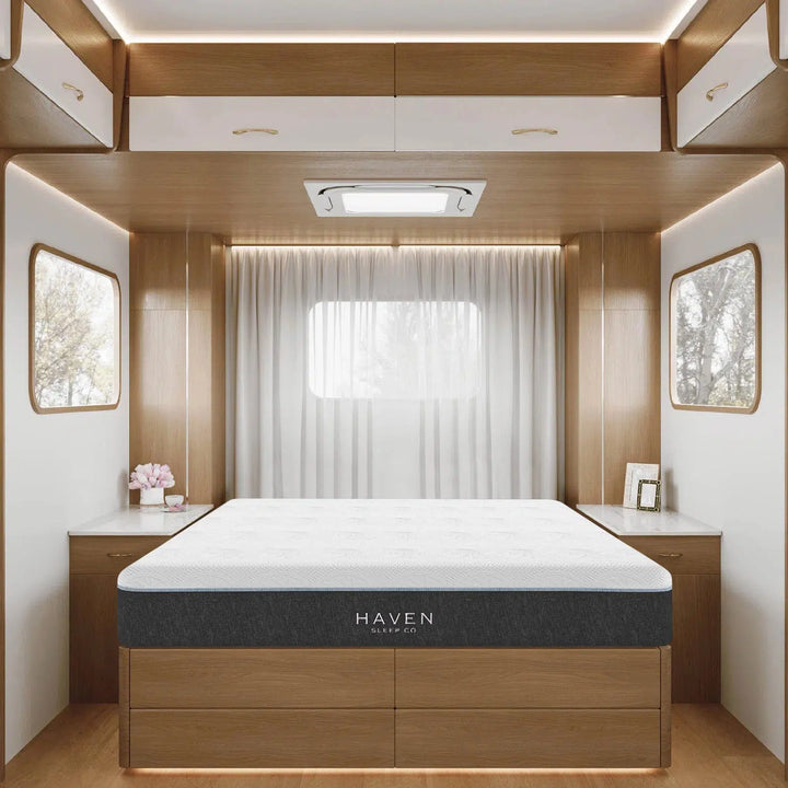 Haven LUX Rejuvenate RV Mattress showcased in a beautifully designed RV with a white and oak interior.