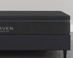 Black mattress with 'Haven Sleep Co' branding on a gray background