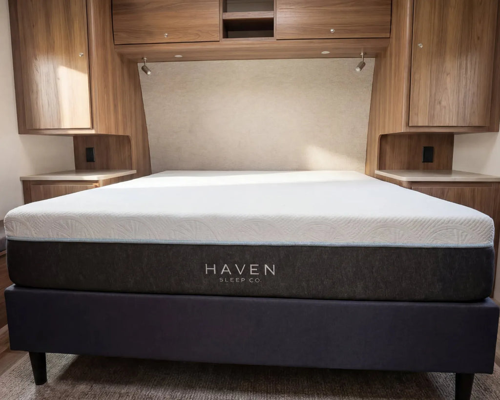 Haven mattress in a room with wooden cabinets and a neutral wall.