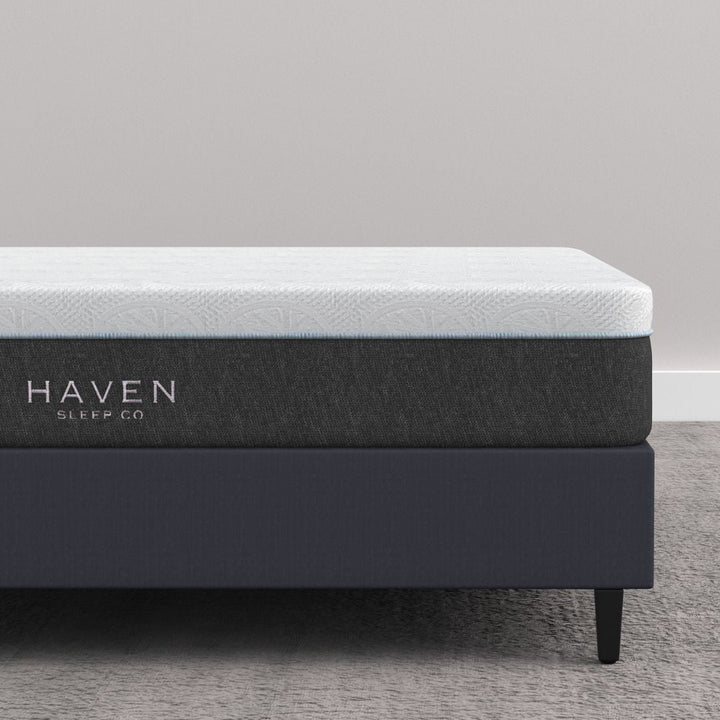 Side profile of Canadian-made LUX Rejuvenate Mattress with Haven Sleep Co branding.