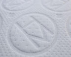 Detailed view of LUX Rejuvenate Mattress breathable fabric with embossed patterns.