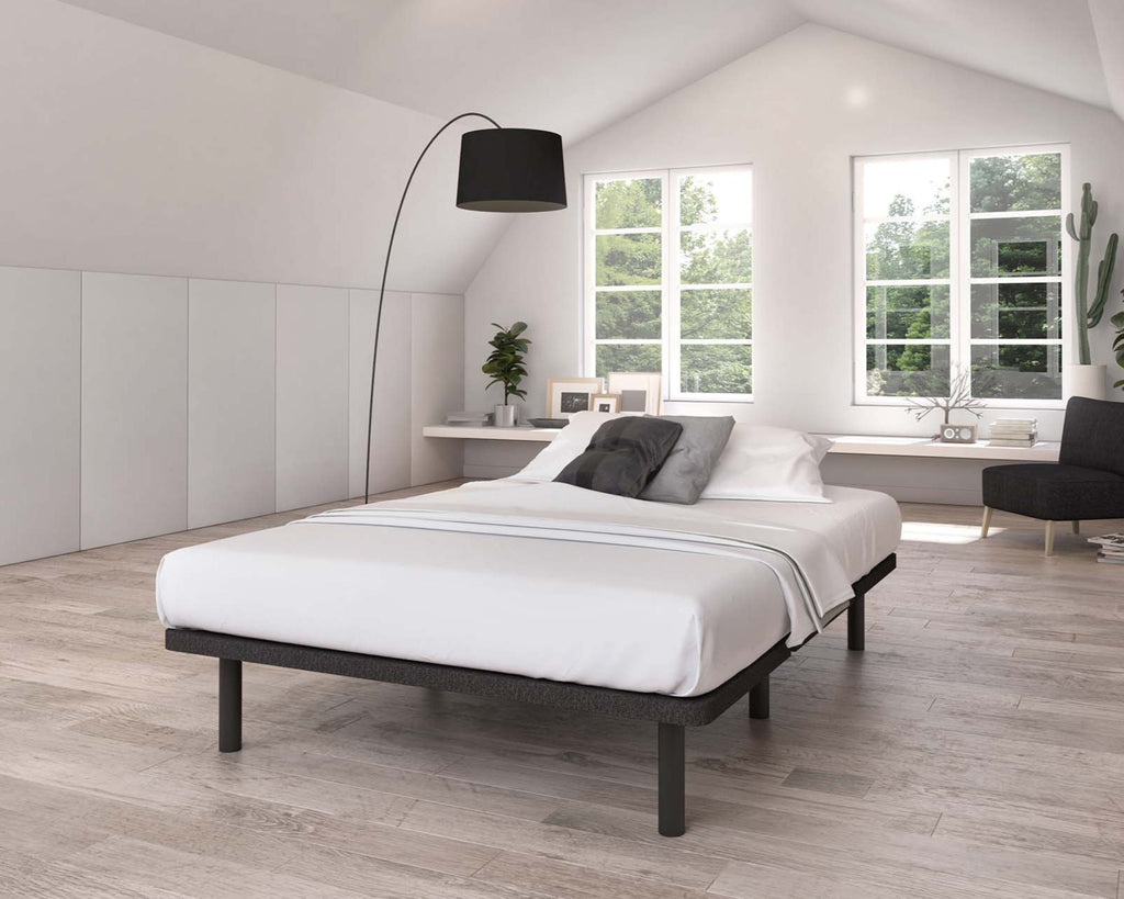 Modern bedroom featuring the Oakville Snap Frame platform bed with white bedding and sleek decor