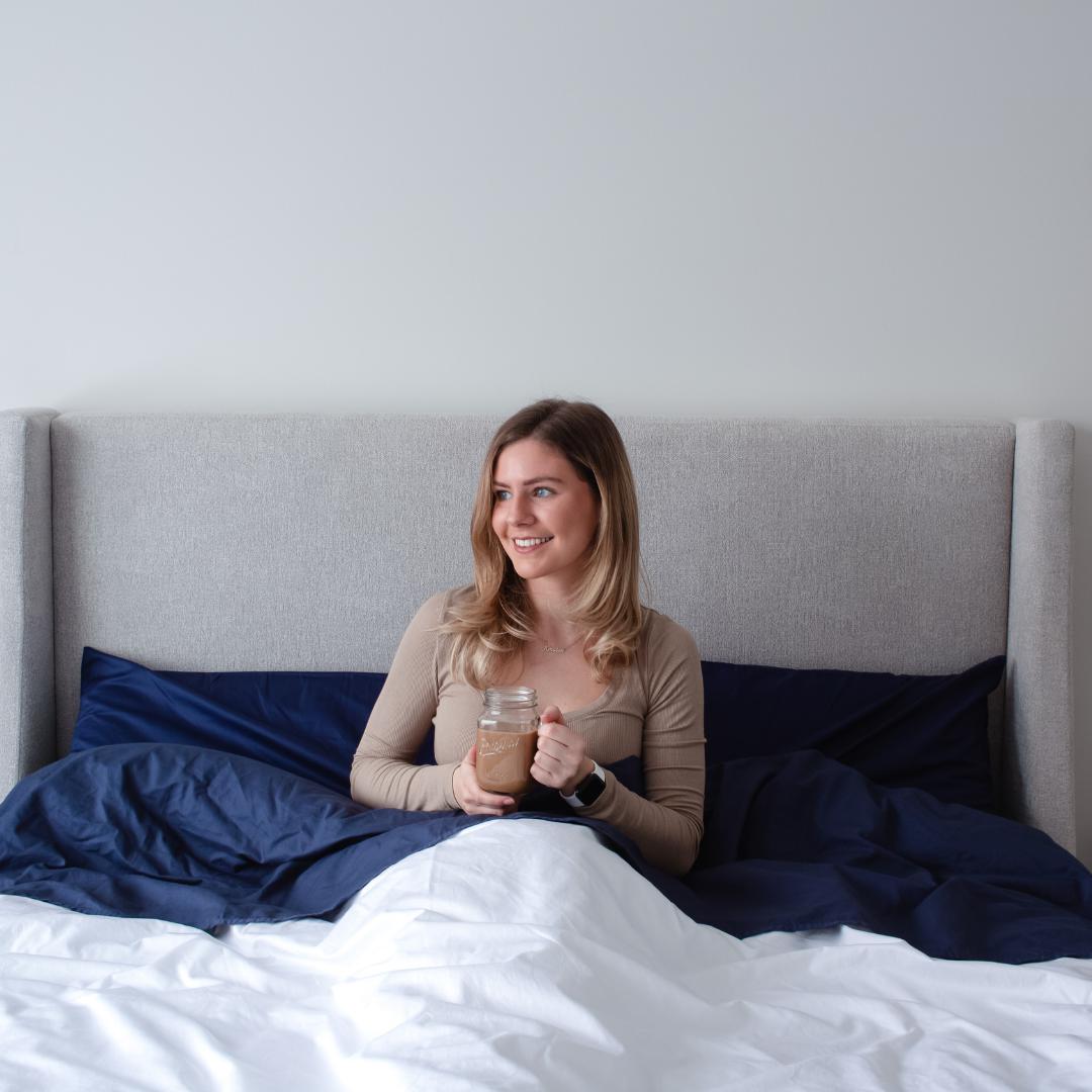 woman reading a book in befdace premium sateen sheets sold by haven sleep co - plant based ecofriendly  mattresses